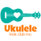 a teal uke on its side with a heart for the sound hole